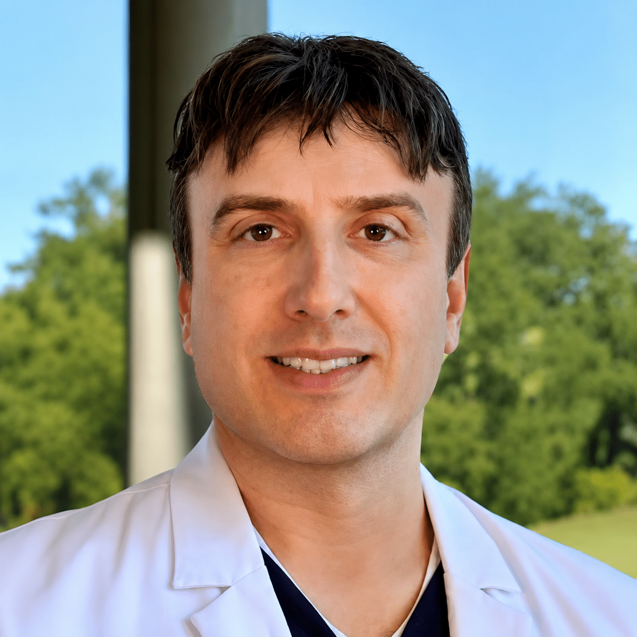 Dr. Bradley Engle, DMD, MHS — Board-Certified Periodontist and Founder of Engle Dentistry, Naples Florida